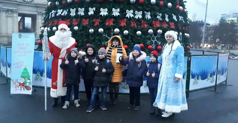 Photo of Moș Crăciun și nepoțica sa vă așteaptă cu zâmbete în PMAN să faceți fotografii. Primarul capitalei: „Acest serviciu este gratuit”