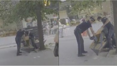 Photo of video | Doi ofițeri, filmați în timp ce rețineau un bărbat pe o stradă din Chișinău, au fost criticați de trecători. Reacția Poliției