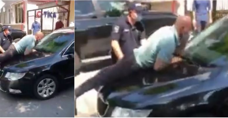 Photo of video | Vladimir Cebotari, luat pe capota unei mașini care ieșea din curtea Președinției. „Am vrut să văd dacă Gațcan e în interior”