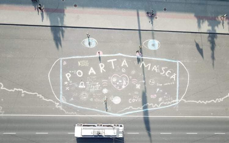 Photo of foto, video | PMAN „poartă” mască de protecție! Desenul uriaș care a apărut în centrul capitalei