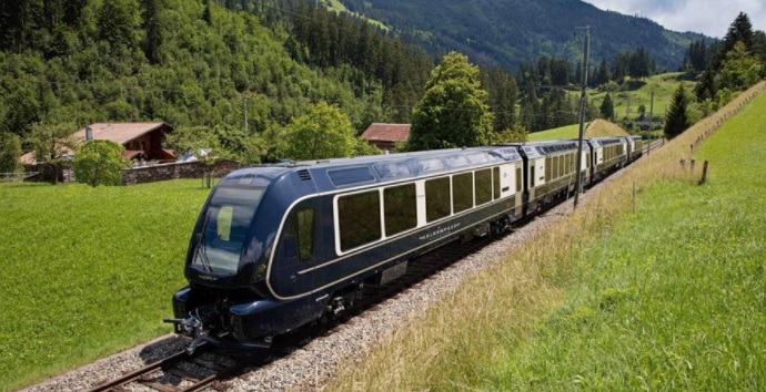 Photo of Elveția a lansat un tren revoluționar care poate trece de pe o șină pe alta și își poate ajusta înălțimea vagoanelor